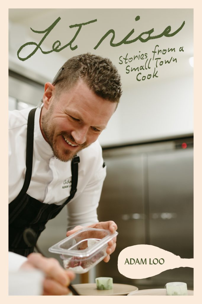 Cover of Let Rise: Stories from a Small Town Cook by Adam Loo. The image shows a smiling man in a chef’s uniform—identified as Adam Loo—leaning forward while plating food in a professional kitchen. He holds a clear container and uses tweezers to delicately place ingredients. The title "Let Rise" appears in handwritten green script at the top, with the subtitle "Stories from a Small Town Cook" beneath it. His name is featured at the bottom in green, printed on a cream-colored spatula graphic, all set against a soft beige frame.
